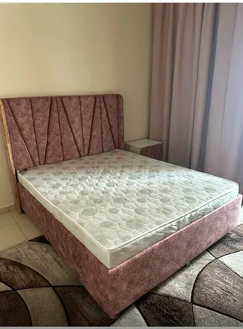 Bed with nightstand