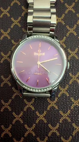 Stylish Swatch Watch with Purple Dial
