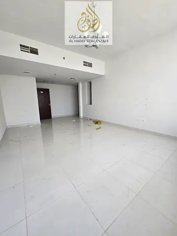 شقة غرفتين وصالة مع بلكونتين في الراشدية 3 على شارع الشيخ خليفة | باركنج