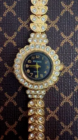Elegant Gold and Crystal Watch