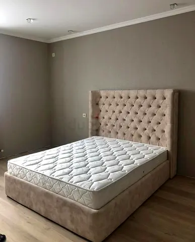 Stylish King Size Bed with Plush Headboard
