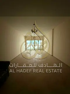 Apartment for rent in Al Taawun, 3 bedrooms with separate hall and maid’s room, 3 bathrooms and wa