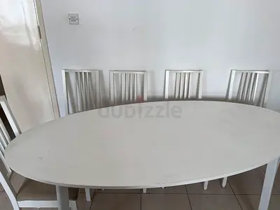 White Oval Dining Table with Chairs