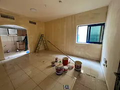Large studio in Al Majarah, central AC, balcony, sea view, flexible payment options.