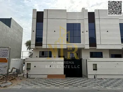 Elegant villa for sale in Al Yasmin, modern design, two floors and a roof, price includes registration and ownership fees.