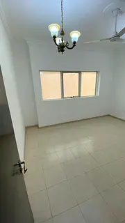 Two-bedroom apartment with a living room - Al Ittihad Street