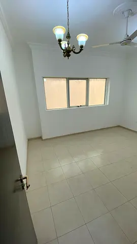 Two-bedroom apartment with a living room - Al Ittihad Street