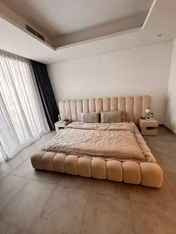 Stylish Bed with Upholstered Headboard