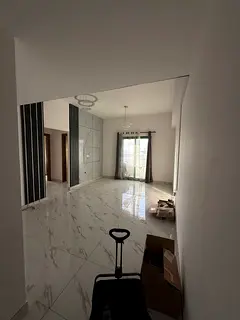Two-bedroom apartment with a living room - annual rent - Al Helio, Ajman - central air conditioning