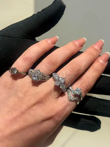 Four rings silver 925 with American diamond. 
New pieces and shiny .
Eash one 250 AED