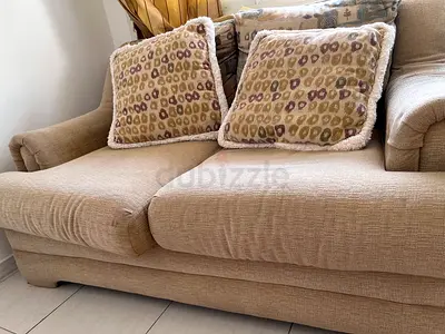 Comfortable Beige Sofa with Cushions