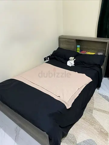 Modern Twin Bed Frame with Storage Headboard and a Mattress. Very good deal