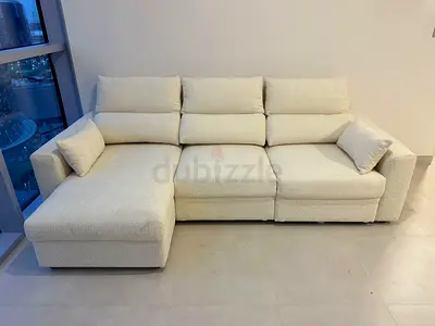 Modern L-Shape Sofa Bed with large storage space. Soft cushions and premium fabric make it very comf