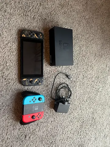 Nintendo Switch Console + Pikachu Gold  Black Joy‑Cons – Factory Reset, Ready to Play
