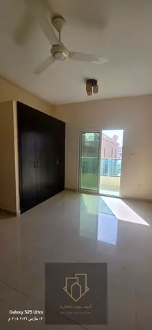 Studio apartment with a very spacious layout, featuring built-in wardrobes and a balcony. Located in a clean building with modern finishing and a very