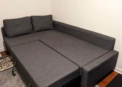 Stylish Grey Sofa Bed with Comfortable Cushions