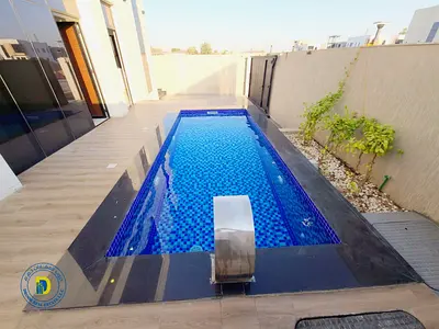 For those seeking luxury, a luxurious villa in Al-Haliou, 4 bedrooms with a swimming pool, including registration fees prime location.