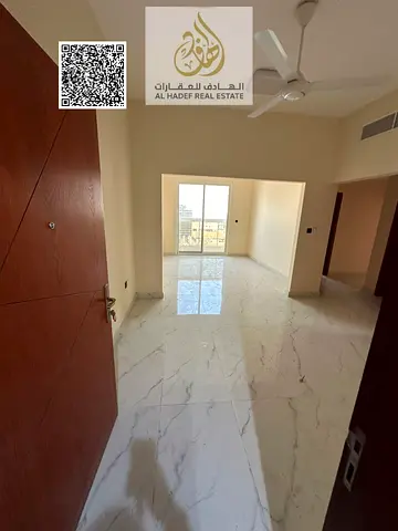 Two-bedroom apartment with a living room and a majlis (formal sitting room), second tenant, annual rent, Al-Jarf 3