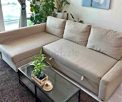 Ikea L Shape Sofa cum bed with big storage in L