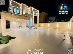 A luxurious villa with a modern design, located in Al Muwaihat 1, featuring spacious areas and high-
