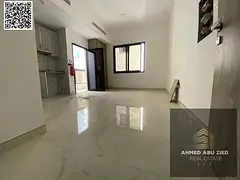 Studio apartment for annual rent in Ajman, Al Alia area, with a balcony, excellent finishing, spacio