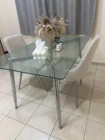 Modern Glass Dining Table with Stylish Chairs