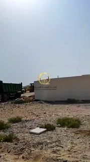 For sale: a plot in the Al-Sajaa Industrial area. Excellent location, corner plot on two streets, 24