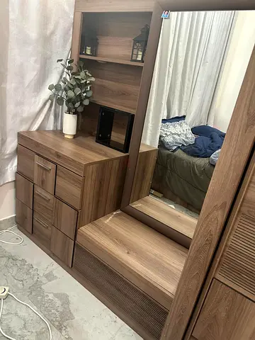 Bed and cot and cupboard