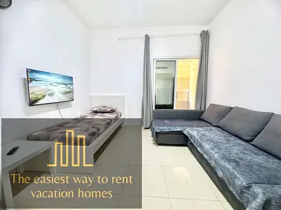 Central 1BR – Quick Commute to Dubai