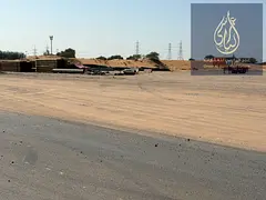 commercial land in AL Belaida 2 , prime location on 97 street .