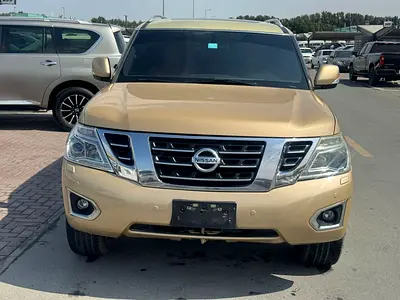 Nissan patrol 2014 fullopshin gold color GCC calen car