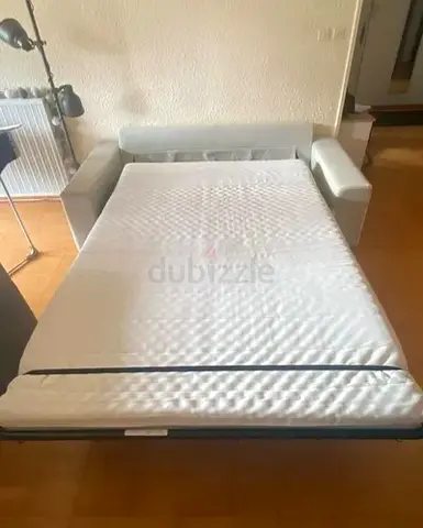 Gunnared beige two seater sofa bed with mattress