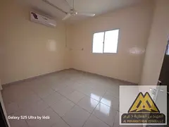 Two-Bedroom Apartment for Annual Rent in Al Rawda 1, Ajman – Separate Living Room and Balcony, Clo