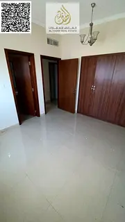 For annual rent in Ajman — a 2-bedroom apartment with a living room, 4 bathrooms, a balcony, a mai