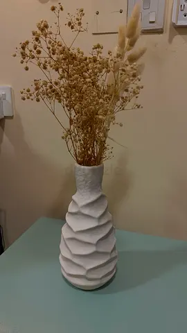 Vase with dried flowers
