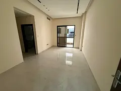 For annual rent in Ajman Apartment consisting of two bedrooms, a living room, and three bathrooms Fi