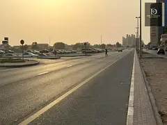 For Sale in Sharjah Al Nakheelat Area Commercial Land Prime Location On a Main Street Al Nuaimiya St