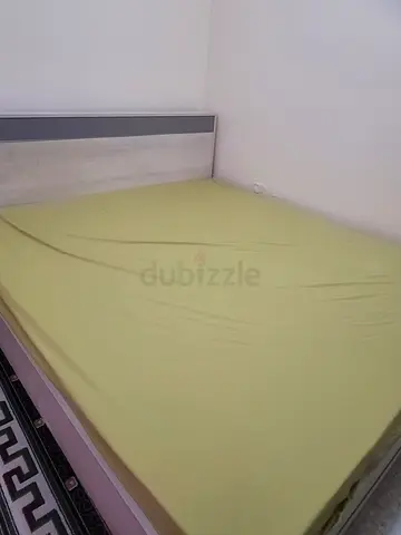 Simple Green Bed Frame with Mattress