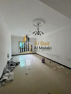 **Two-bedroom apartment with a living room and maid's room for rent in Al Taawun | Central air c