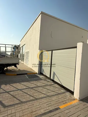 Warehouse for sale in Al-Hano Al-Jalil, Al-Saja'a Industrial Area. (Warehouse + workers' accommodation + commercial shops). Land area: 21,265 sq ft