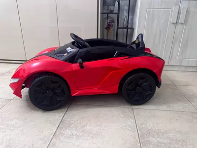 Red Electric Ride-On Car for Kids