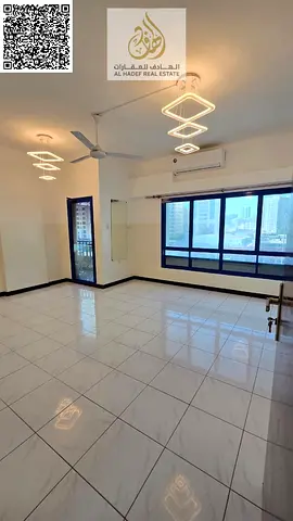 One-bedroom apartment with a living room, two bathrooms, a balcony, and a hallway. One of the largest apartments in Ajman at the lowest prices in Al N