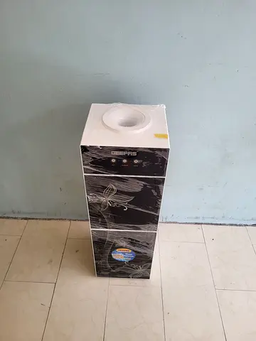 Top load water dispenser