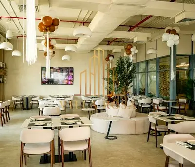 محل تجاري للبيع في الممزر – موقع استراتيجي داخل برج سكني تجاري