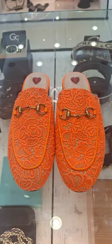 Stylish Orange Embroidered Slip-On Shoes