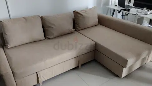 Comfortable Beige Sofa Bed for sale.