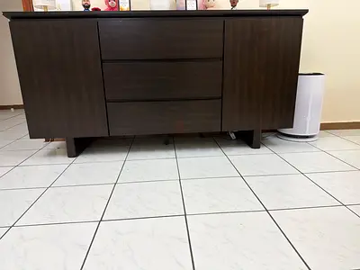 Stylish Wooden Cabinet with Three Drawers