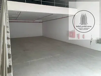 مستودع مميز للإيجار في الجرف الصناعية 1 مع ميزانين وكهرباء 25 كيلو