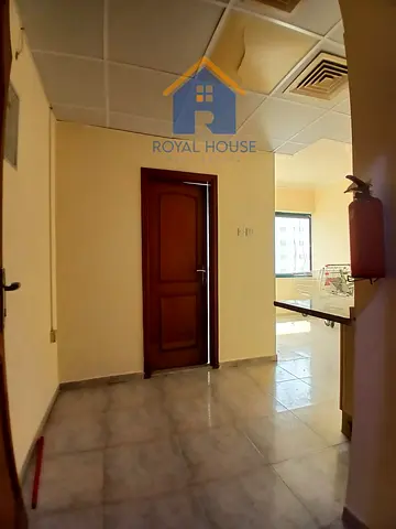 Annual Rent in Sharjah Studio Apartment Partitioned into a Bedroom and Living Room for AED 28,000 per year.