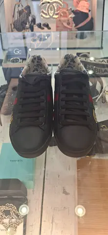 Stylish Black Sneakers with Floral Design